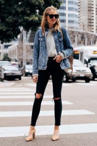 women rocking denim jacket